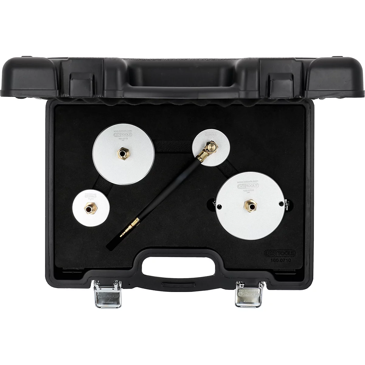 Werkzeugkoffer mit Werkzeugen, enthält runde Metallplatten und einen Schlauch. Auf schwarzem Schaumstoff gebettet.